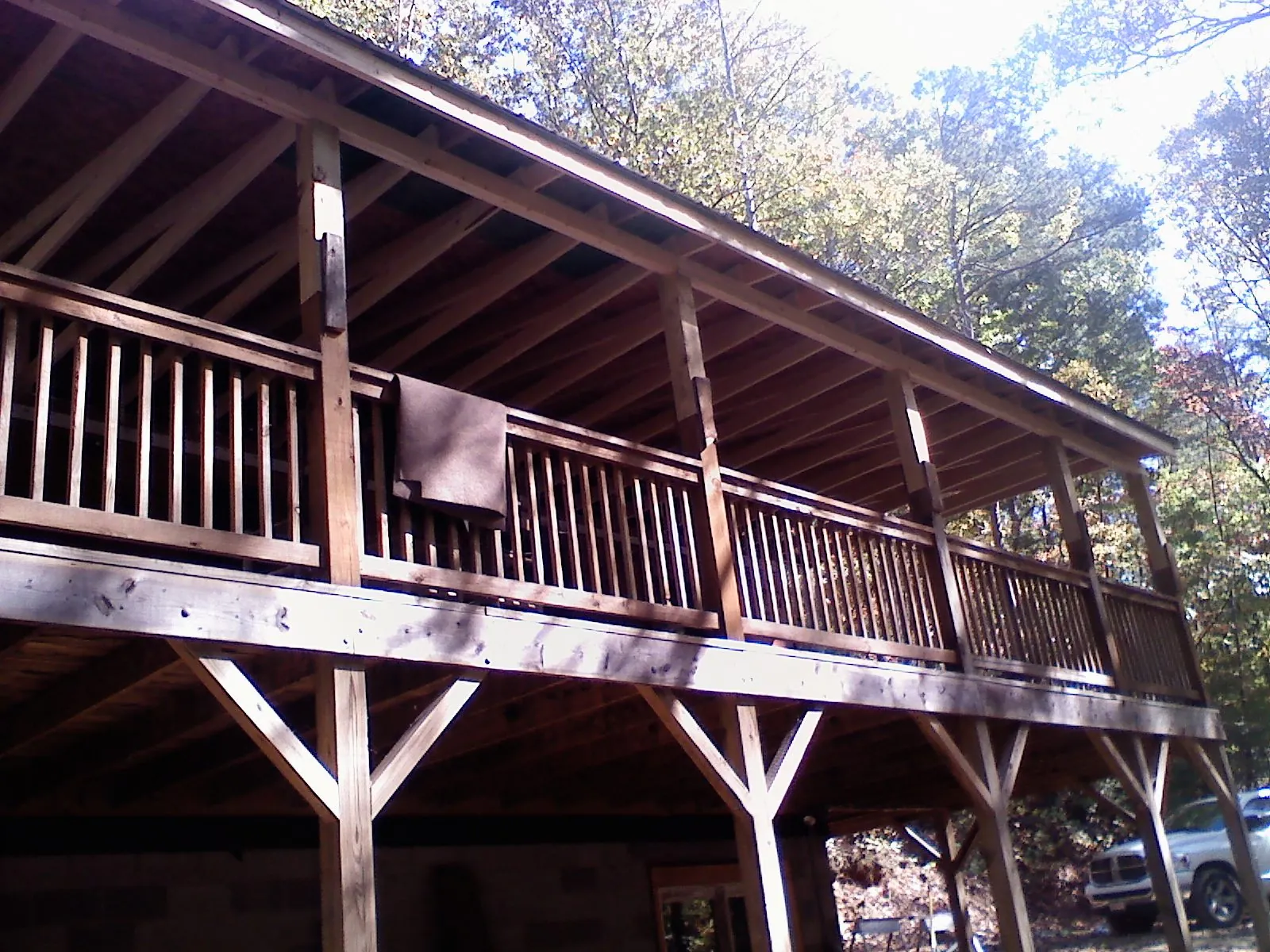 Timber framing under a new elevated porch and deck — Roof Leak Repair in Waukegan by Roofing Brothers